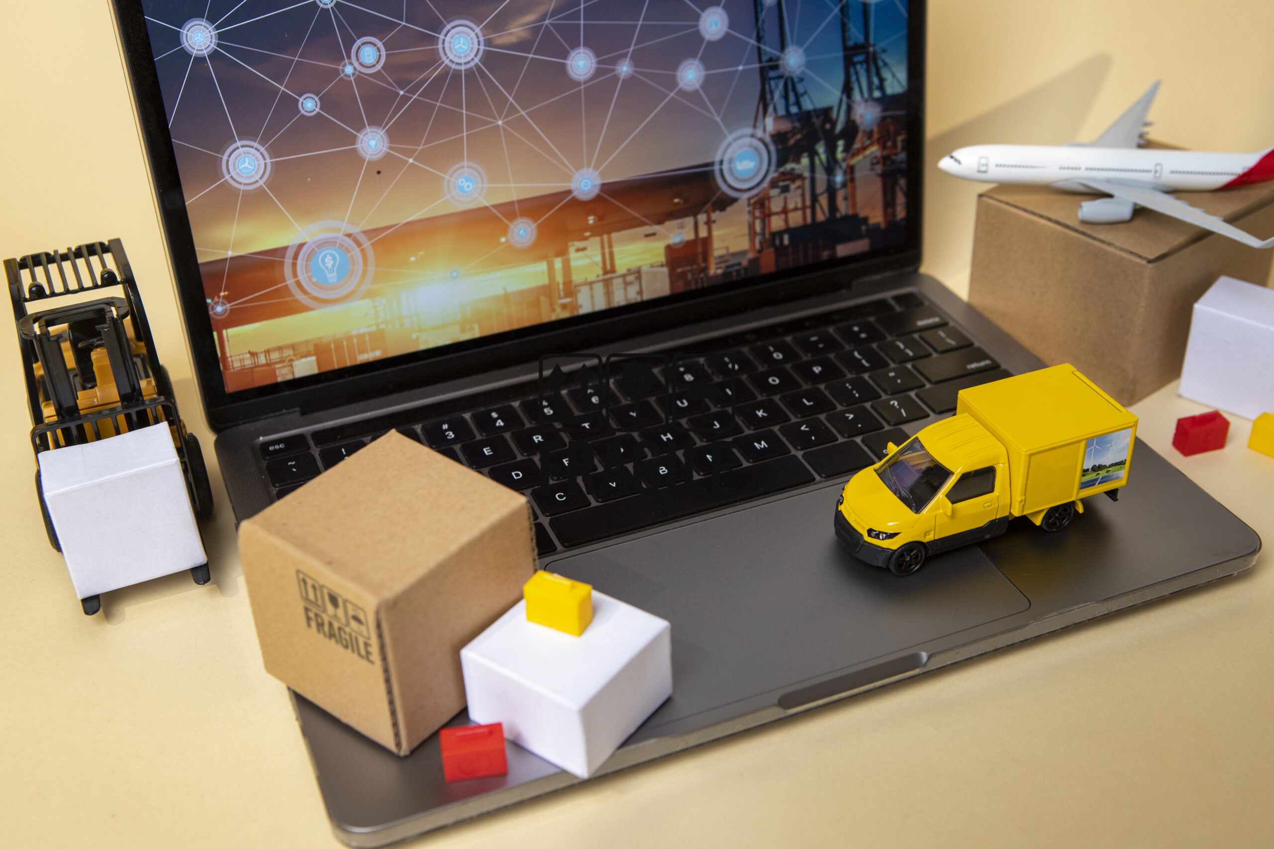 Vehicles on laptop supply chain representation