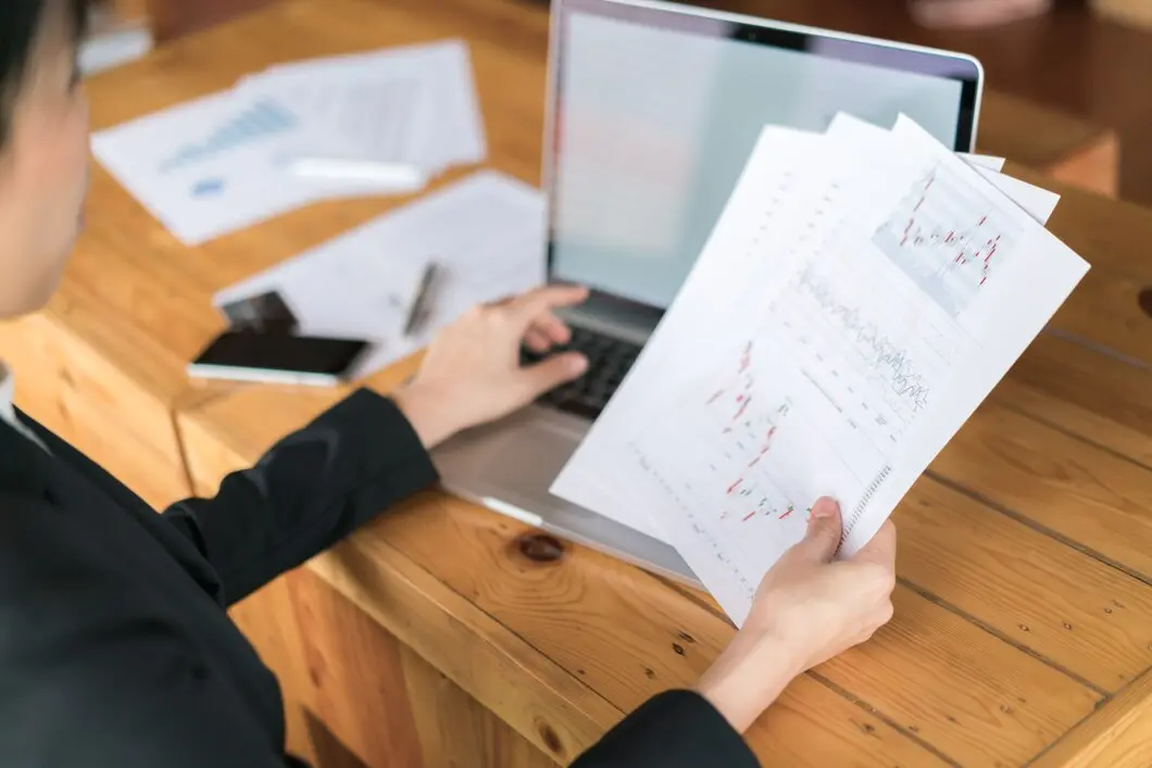  reviewing financial charts 