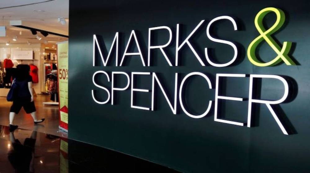 Entrance to a Marks & Spencer store, featuring prominent brand signage